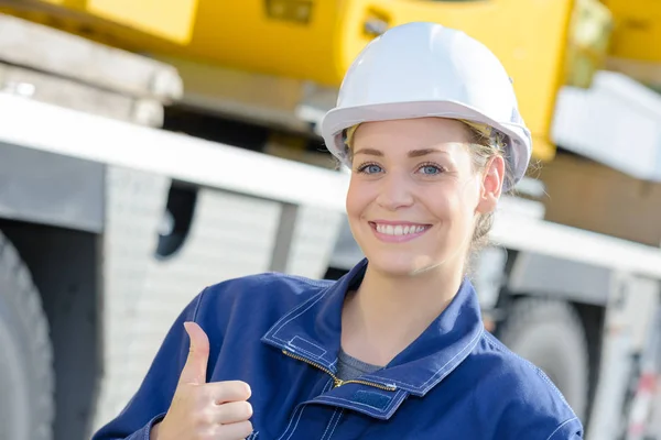 thumbs up from construction worker