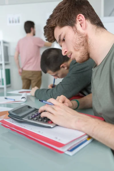 3 students in classroom — Stock Photo, Image