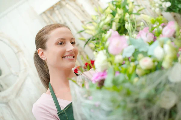 Florist and apron  blooming — Stock Photo, Image