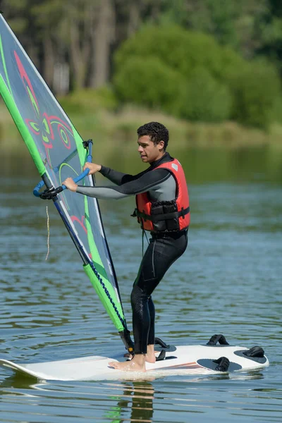 A man is doing windsurf — Stock Photo, Image