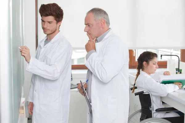 Interns in white coat — Stock Photo, Image