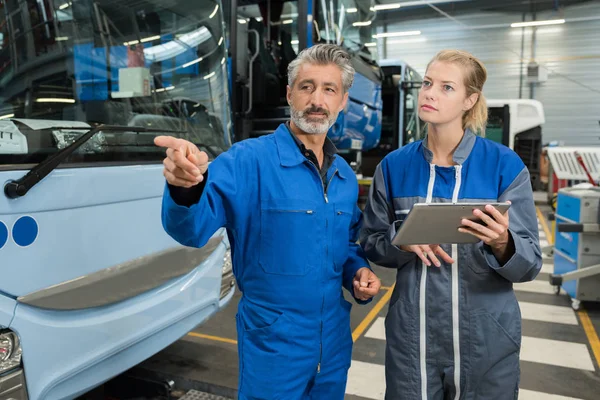 A mechanic looking at spanner — ストック写真