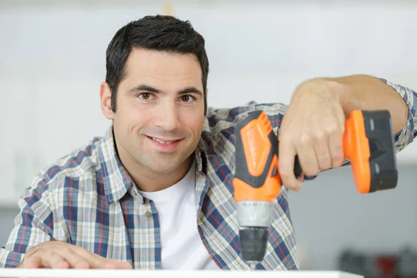 Drilling a screw into wood with drill — Stock Photo, Image