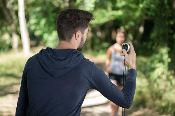 Portait di un corridore con cronometro — Foto Stock