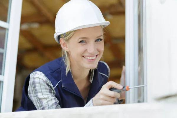 Professional Woman Using Screwdriver Window — Stock Photo, Image