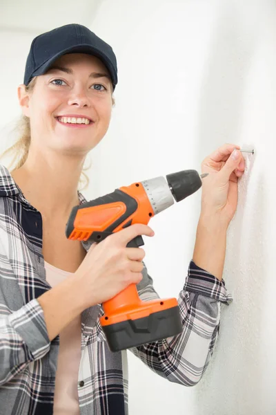 Woman Drilling Wall New House — Stock Photo, Image