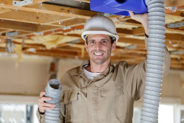 Male Builder Repairing Ceiling — Stock Photo, Image