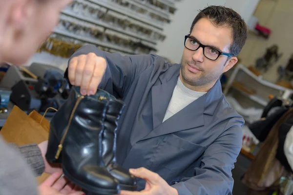 Cobbler Giving Shoes Customer — Stock Photo, Image