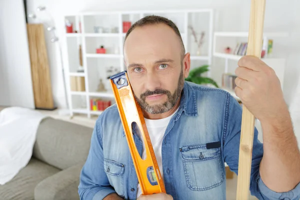 Middle Aged Man Carpenter Level — Stock Photo, Image