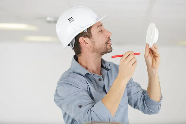 Technician Tests Fire Alarm — Stock Photo, Image