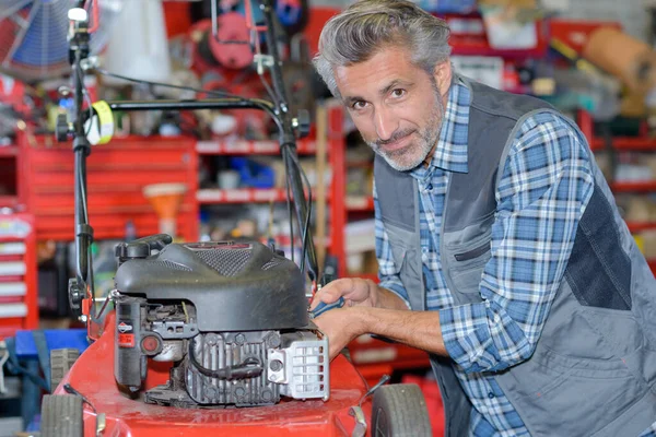 Fixing Lawn Mower — стоковое фото