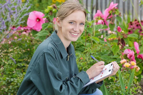 Woman Gardening Smiling Stock Image