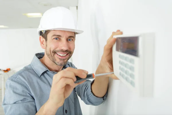 Man Fitting Digital Thermostat — Stock fotografie