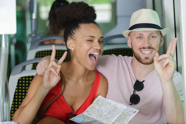 Young Couple Taking Wacky Picture Bus — Stockfoto