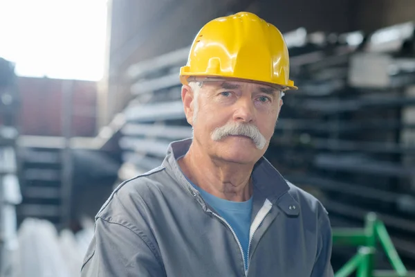 man with helmet looking at camera