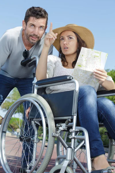 Woman Wheelchair Pointing Distance — Stock Photo, Image