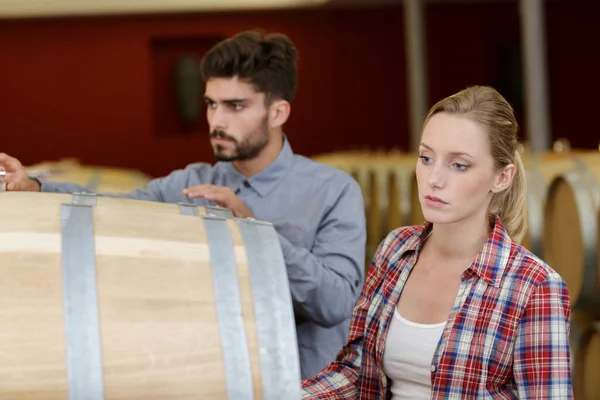 Two Staff Inspecting Barrels Wine Factory Warehouse — Stock Photo, Image