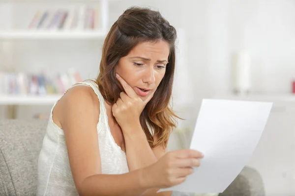 Worried Woman Reading Bad News Letter — Stock Photo, Image