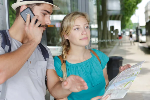 Attractive Male Female Tourist Holding Map — Stock Photo, Image