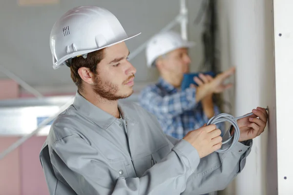 Construtor Com Quipment Dentro Casa — Fotografia de Stock