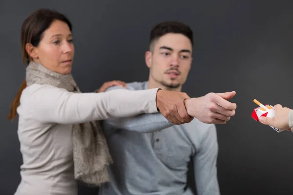Woman Trying Stop Her Son Taking Cigarette — Stock Photo, Image