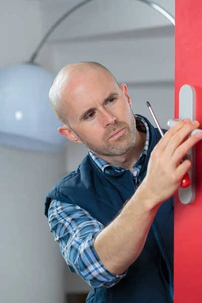 Contractor Fixing Interior Door — Stock Photo, Image