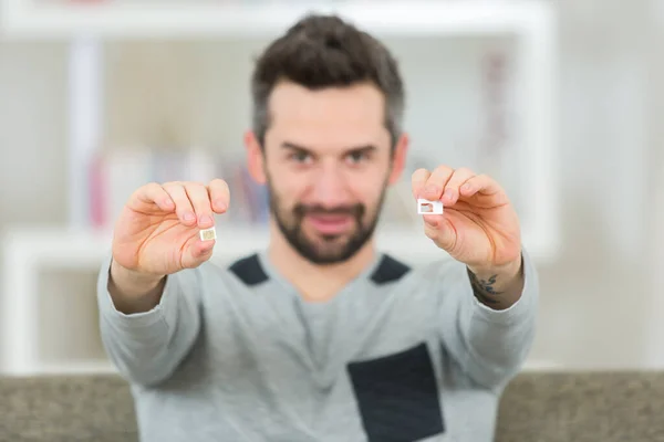 Man Holding Two Sim Cards — Stock Photo, Image