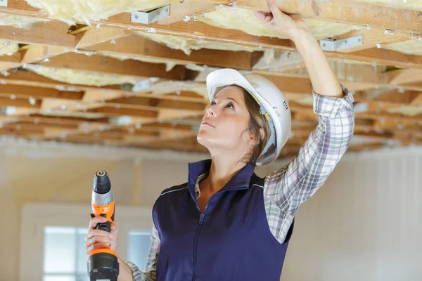 Woman Drilling Ceiling Site — Stock Photo, Image