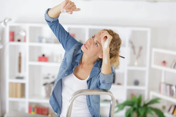 Tired Woman Painting Ceiling Overhead — Stock Photo, Image