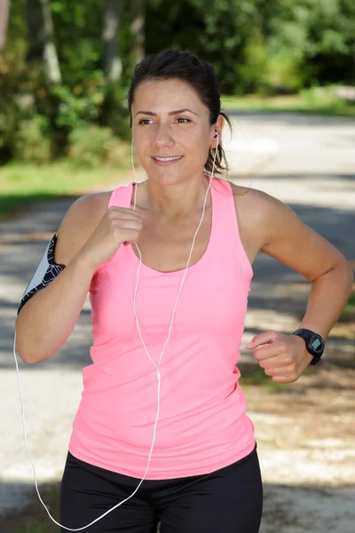 Woman Runner Listening Music Earphones Workout — Stock Photo, Image