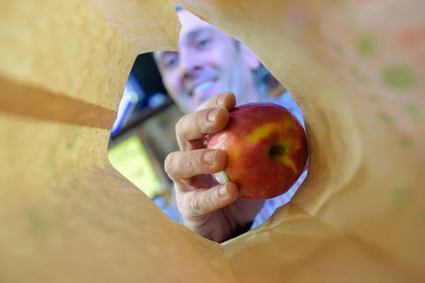 Shopper Putting Apples Paper Bag — Stock Photo, Image