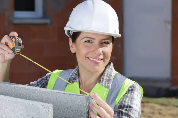 Happy Female Engineer Helmet Holds Tape Measure — Stock Photo, Image