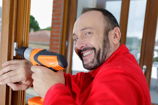 Happy Smiling Foreman Keeping Drill — Stock Photo, Image