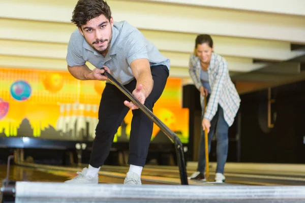 Man Cleaning Bowling Alley — Stock Photo, Image