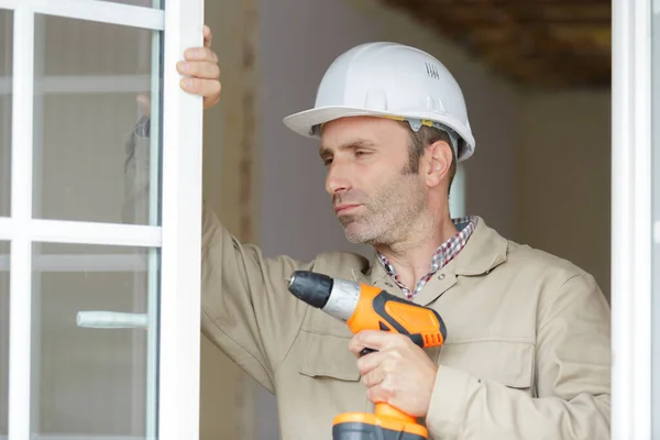 Male Builde Holding Drill — Stock Photo, Image