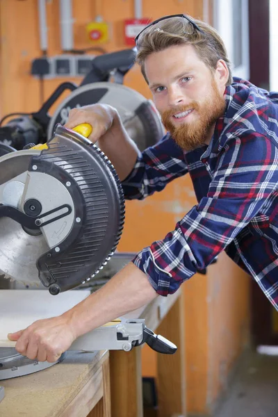 Construction Worker Using Slider Compound Mitre Saw — Stock Photo, Image