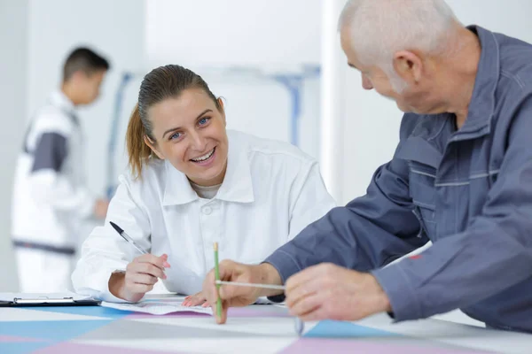 Female Painting Renovation Apprentice Laughing — Stockfoto