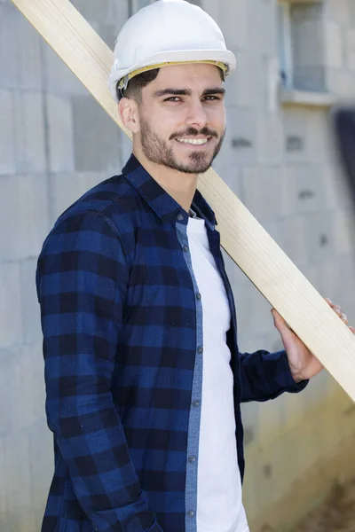 Happy Young Man Builder Carrying Wood Working — Stock Photo, Image