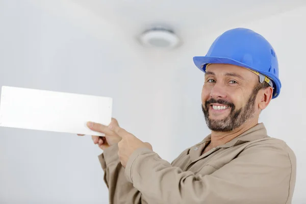 Man Standing Writing Folder White Background — Stock Photo, Image