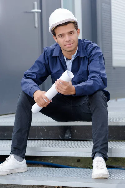 Businessman Holding Blue Print Sitting Stairs — Stock Photo, Image