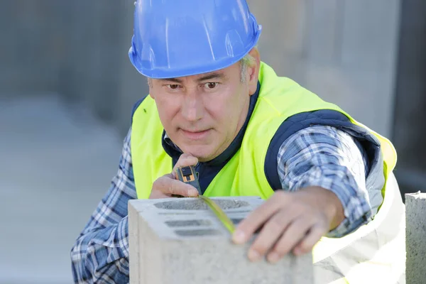 Homem Construção Conceito Medição — Fotografia de Stock