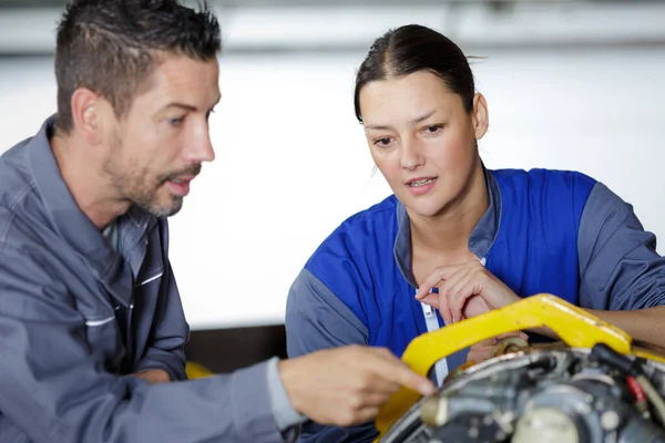 Two Mechanics Working Car Stock Picture