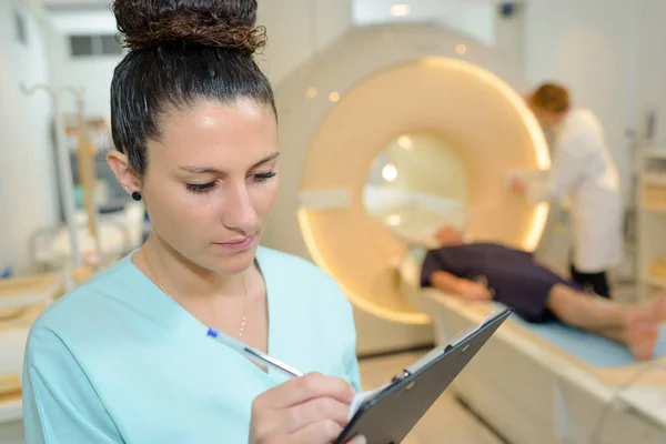 Medical Nurse Checking Report Clipboard Hospital — Stock Photo, Image