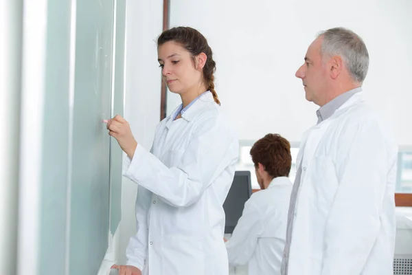 Young Woman Writing Blackboard — Stock Photo, Image