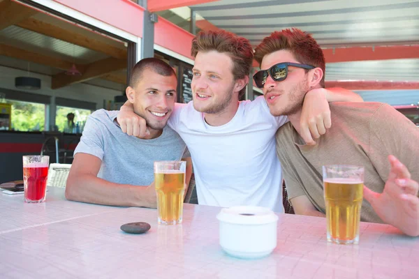 Three Friends Drinking Beer — Stock Photo, Image