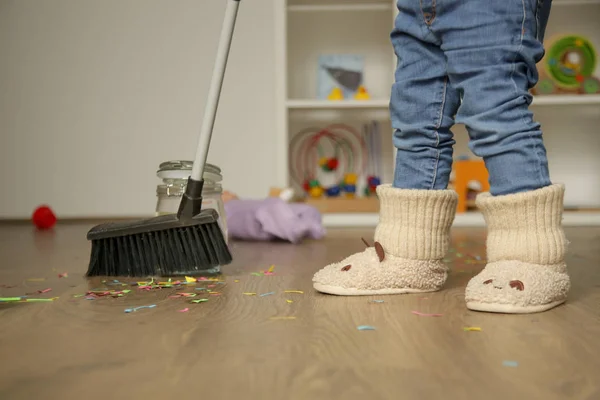 Adorable Blonde Toddler Girl Playing Broom Cleaning Colorful Confetti Floor — Stock Photo, Image