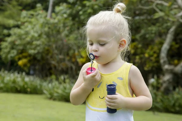 Happy Little Toddler Girl Blowing Soap Bubbles Park — Stock Photo, Image