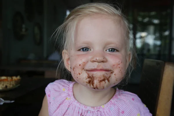 Candid Portrait Toddler Girl Eating Chocolate Cake Happy Childhood Concept — Stock Photo, Image