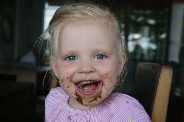 Candid Portrait Toddler Girl Eating Chocolate Cake Happy Childhood Concept — Stock Photo, Image