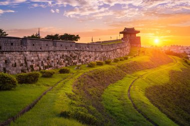 Hwaseong Fortress in Sunset, Traditional Architecture of Korea a clipart